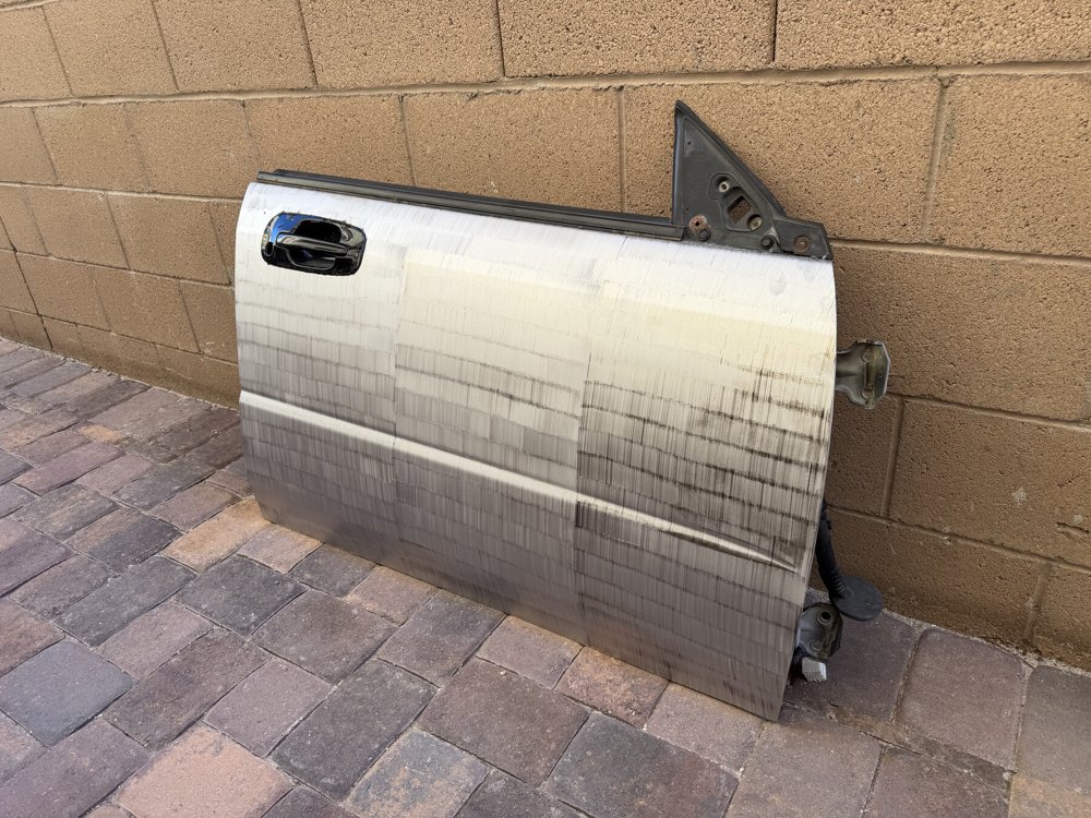 Automotive door restoration after laser cleaning