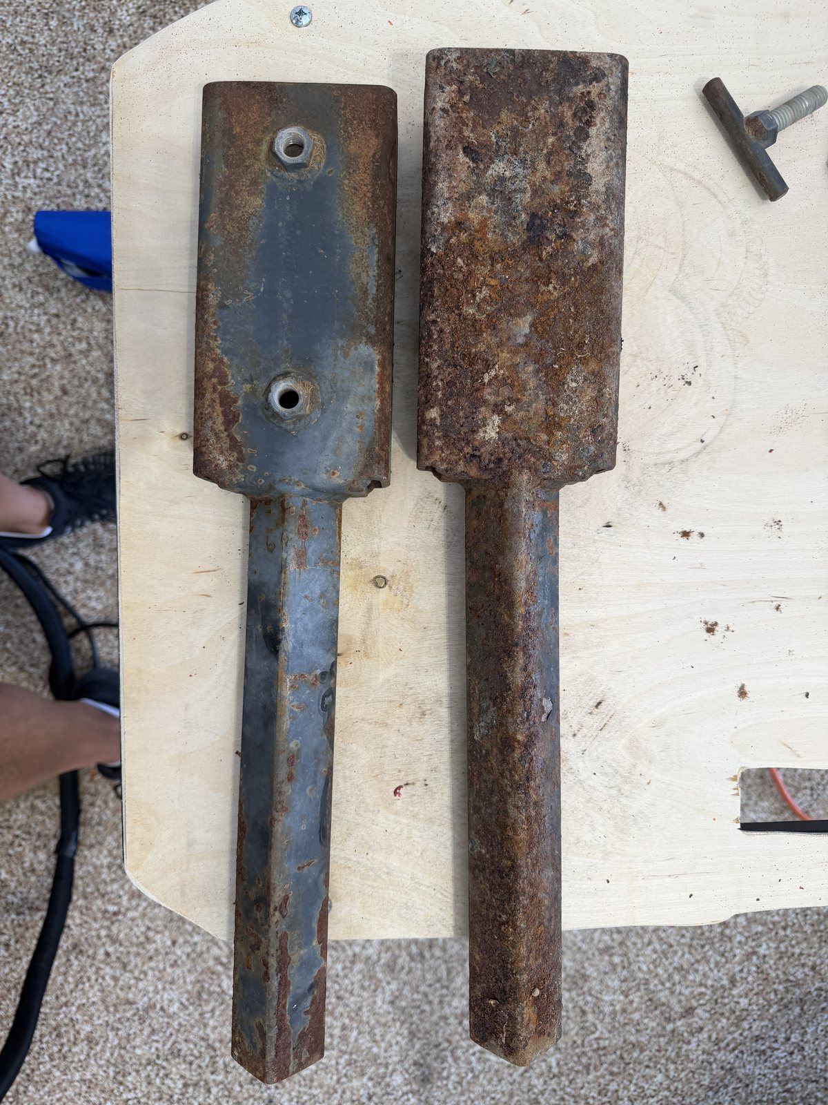 Rusted steel stand legs before laser cleaning